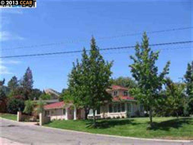 11 Rita Way Orinda, CA 94563 - Photo 1 of 1 a front view of a house with a garden