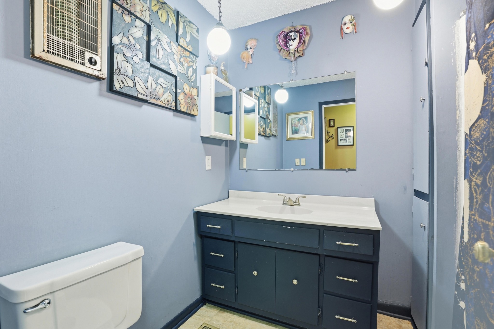 275 Lakeside Drive Carthage, TN 37030 - Photo 18 of 22 a bathroom with a toilet sink and mirror
