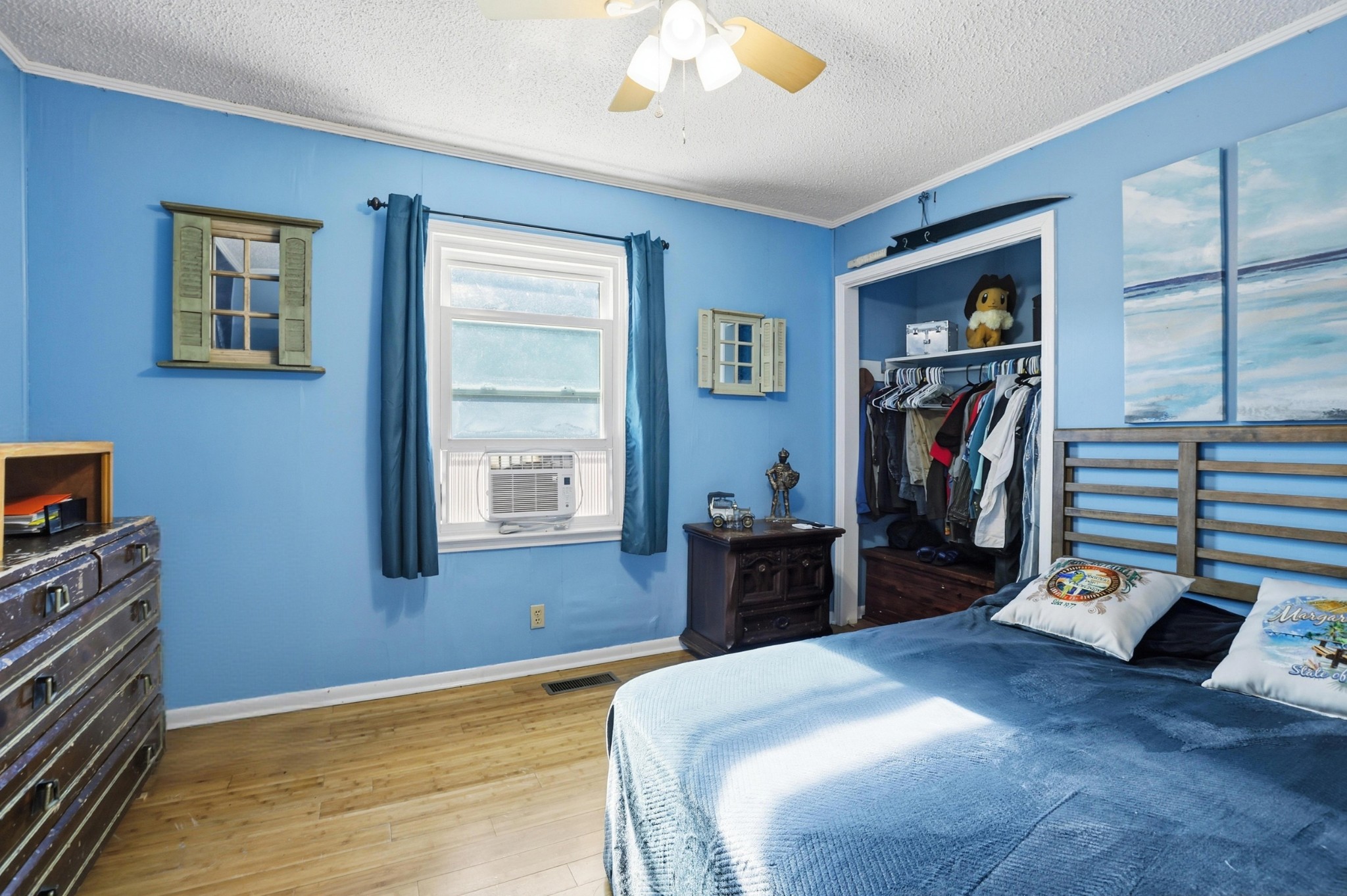 275 Lakeside Drive Carthage, TN 37030 - Photo 19 of 22 a bedroom with a bed and a flat tv screen on dresser