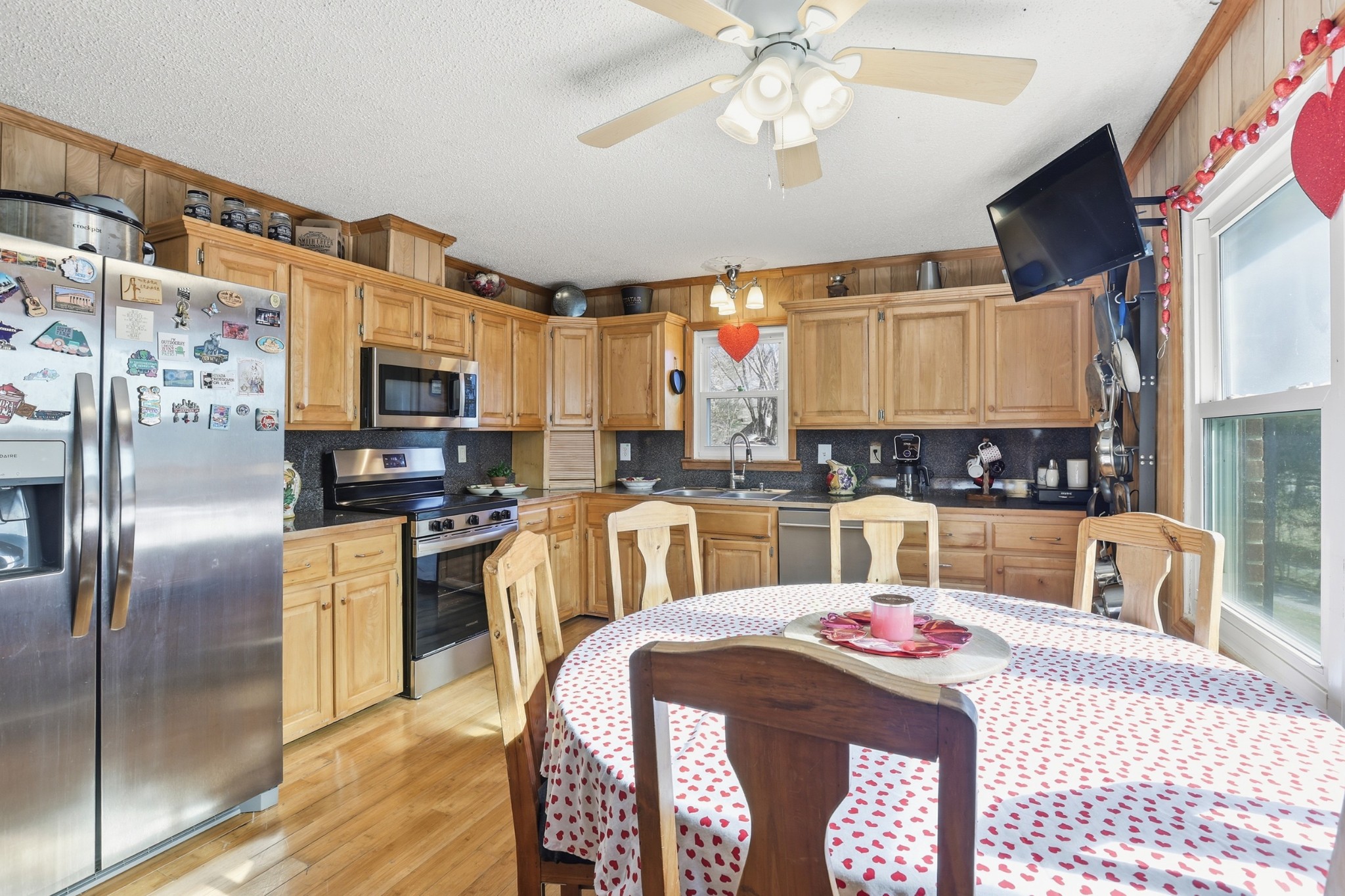 275 Lakeside Drive Carthage, TN 37030 - Photo 7 of 22 a kitchen with stainless steel appliances kitchen island granite countertop a sink and cabinets