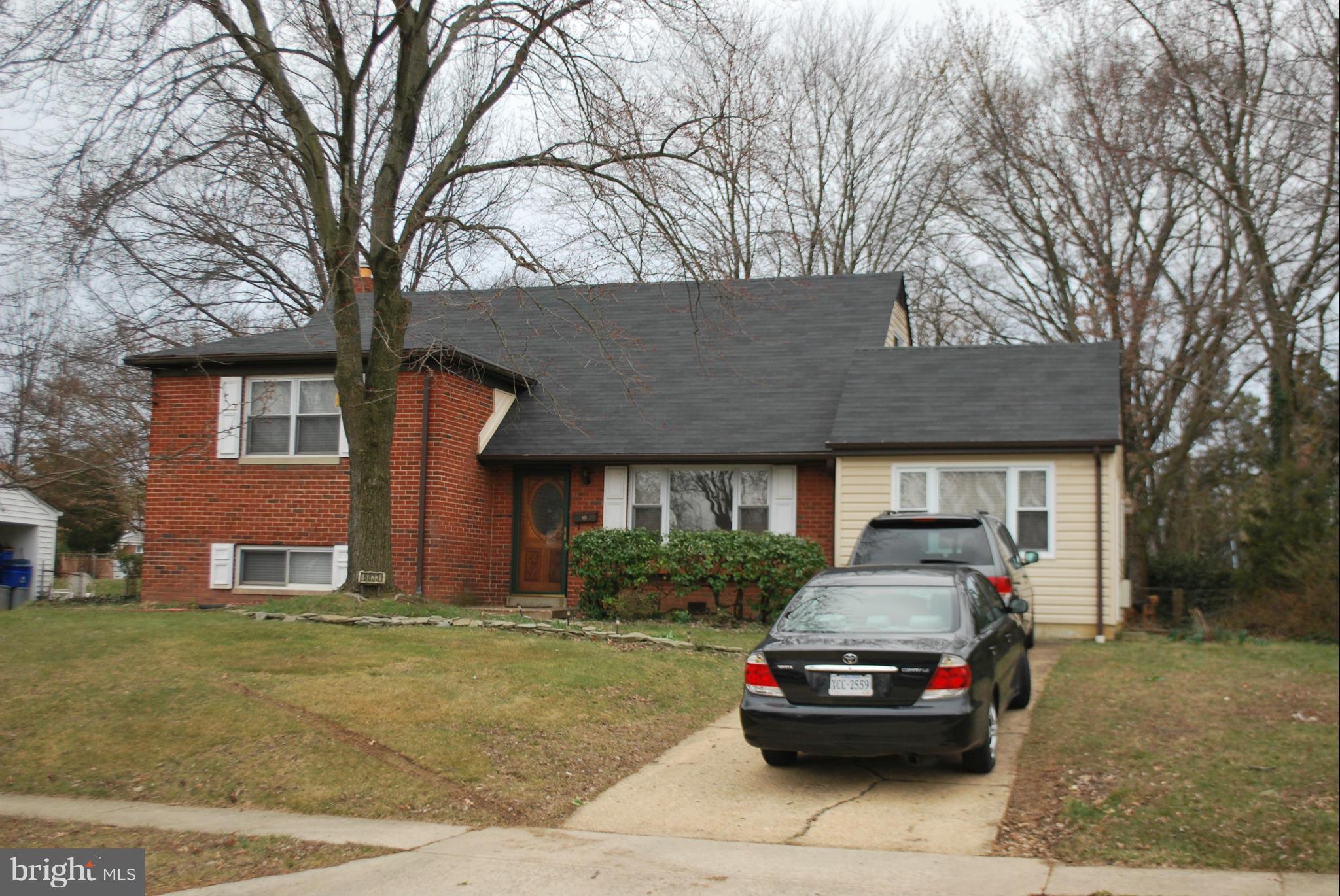 6833 Inverness Drive Springfield, VA 22150 - Photo 3 of 30 a car parked in front of a house