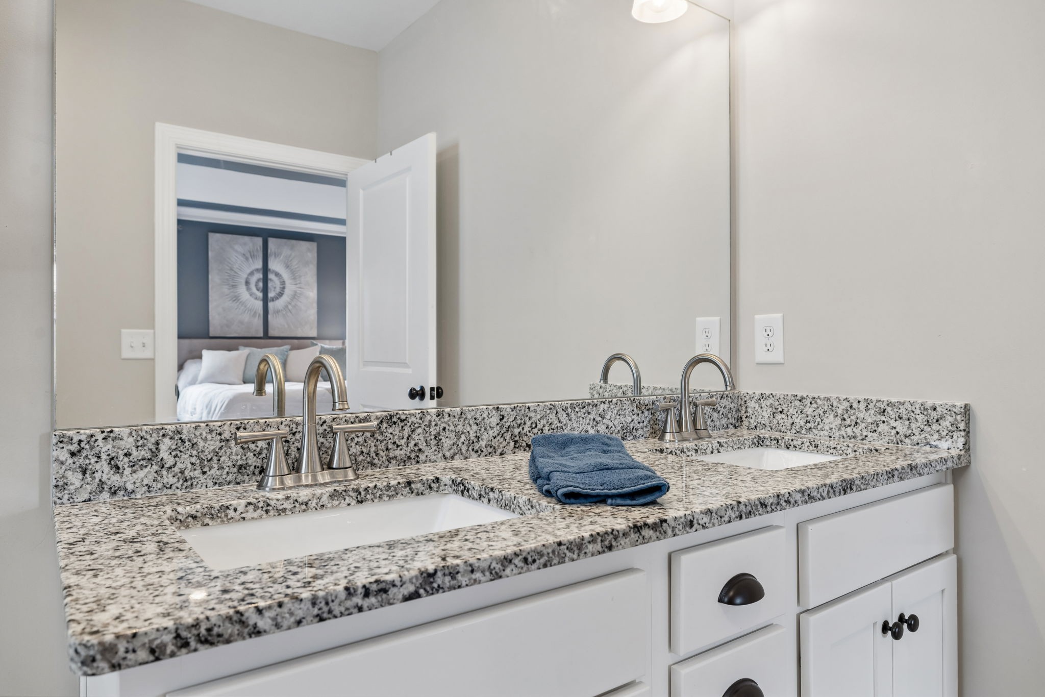 1002 Garrison Way Spring Hill, TN 37174 - Photo 46 of 63 a bathroom with a granite countertop sink and a mirror