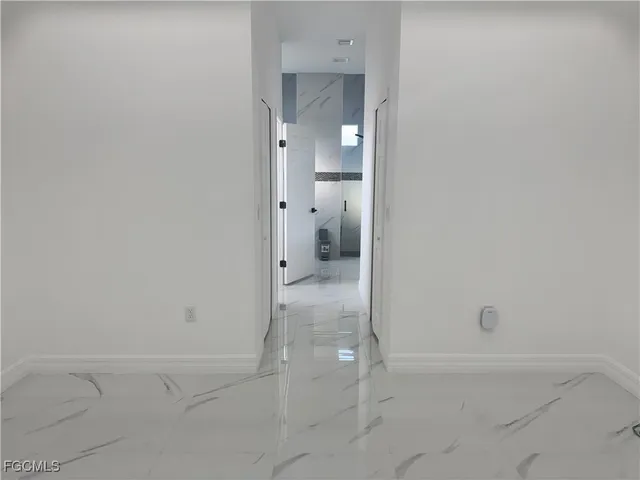 a bathroom with a tub and a shower