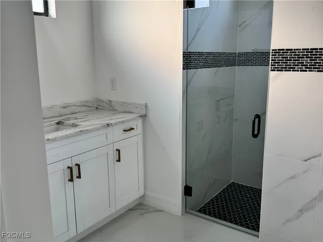 a utility room with cabinets