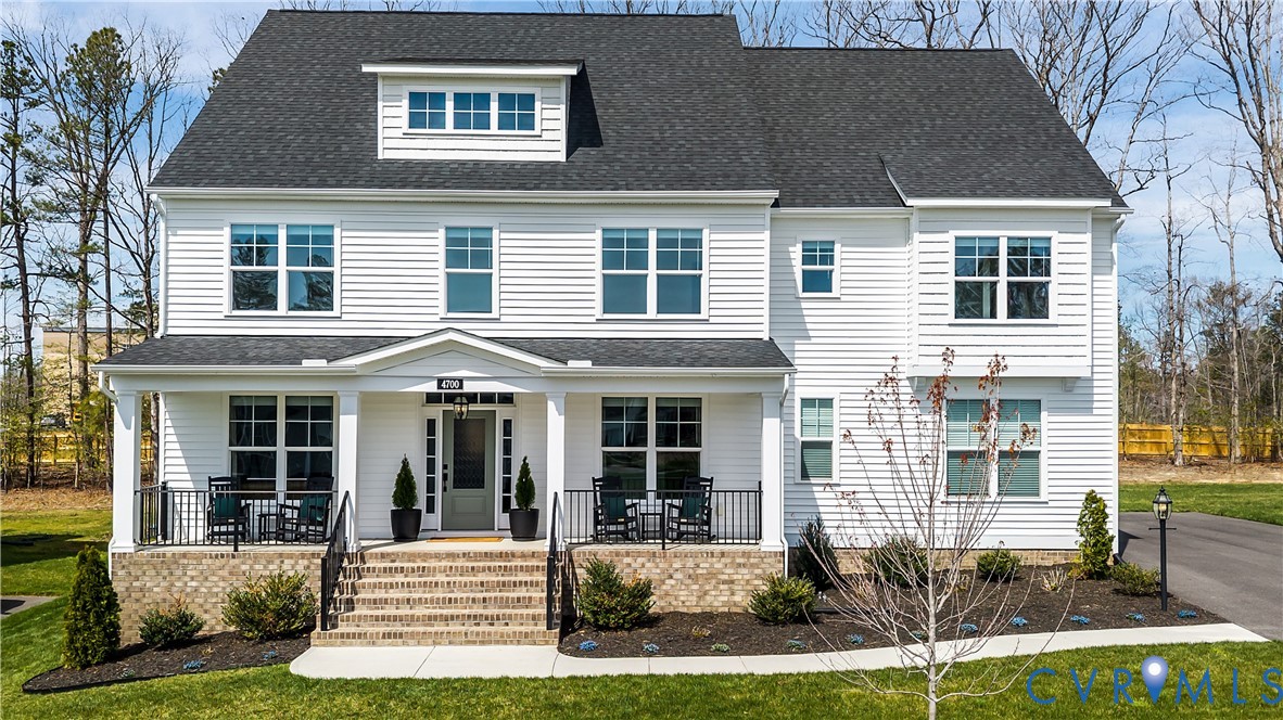 4700 Melbrook Way Moseley, VA 23120 - Photo 1 of 58 a front view of a house with a yard