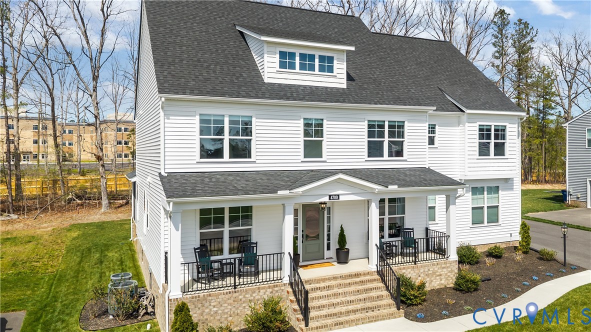 4700 Melbrook Way Moseley, VA 23120 - Photo 2 of 58 a front view of a house with garden