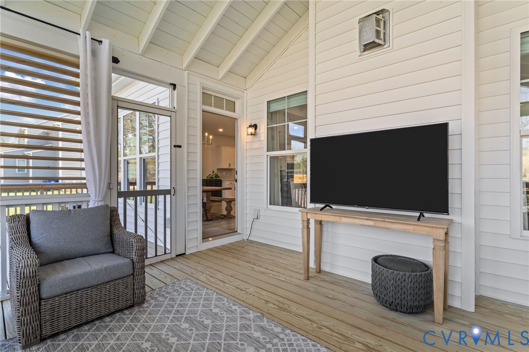 4700 Melbrook Way Moseley, VA 23120 - Photo 23 of 58 a living room with furniture and a flat screen tv