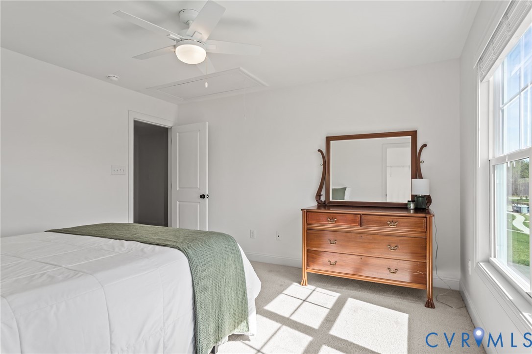 4700 Melbrook Way Moseley, VA 23120 - Photo 26 of 58 a bedroom with a bed and window