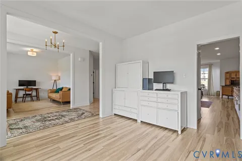 a room with furniture and a wooden floor