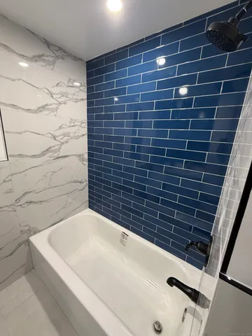 a bathroom with a bathtub