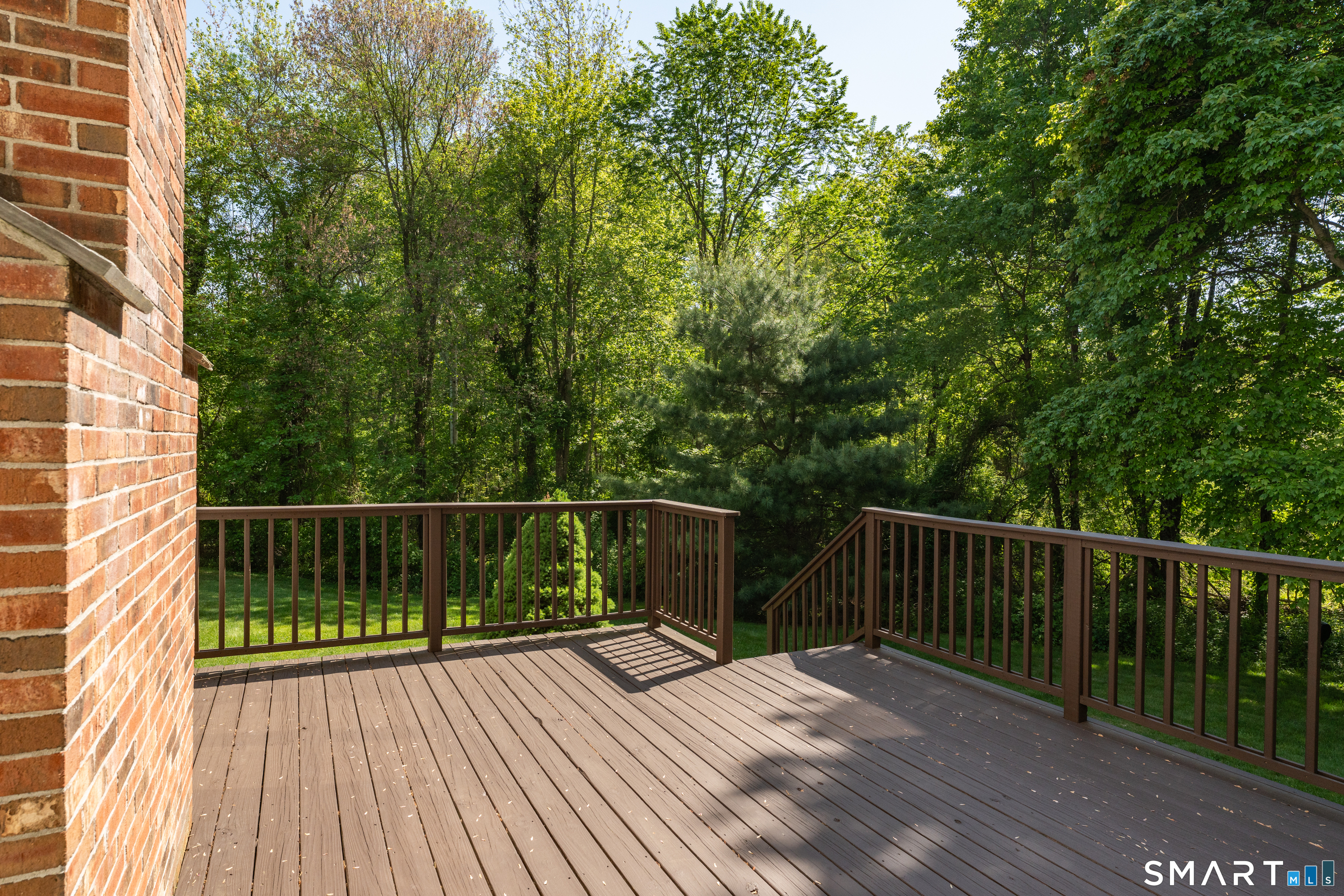 474 State Street Guilford, CT 06437 - Photo 35 of 40 a view of balcony with wooden floor and fence