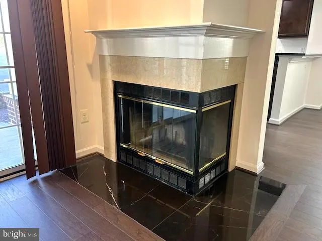 a stove top oven sitting inside of a kitchen