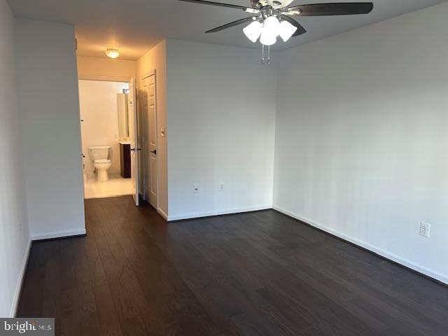 104 Kendrick Place, Unit 18 Gaithersburg, MD 20878 - Photo 10 of 18 an empty room with wooden floor and windows