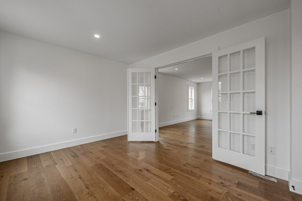 36 Belvidere Road Haverhill, MA 01830 - Photo 11 of 18 a view of wooden floor and windows in a room