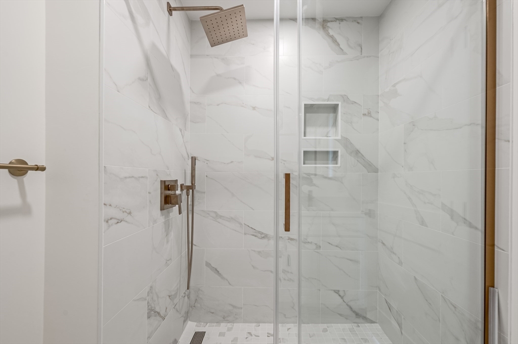 36 Belvidere Road Haverhill, MA 01830 - Photo 14 of 18 a bathroom with a glass shower door