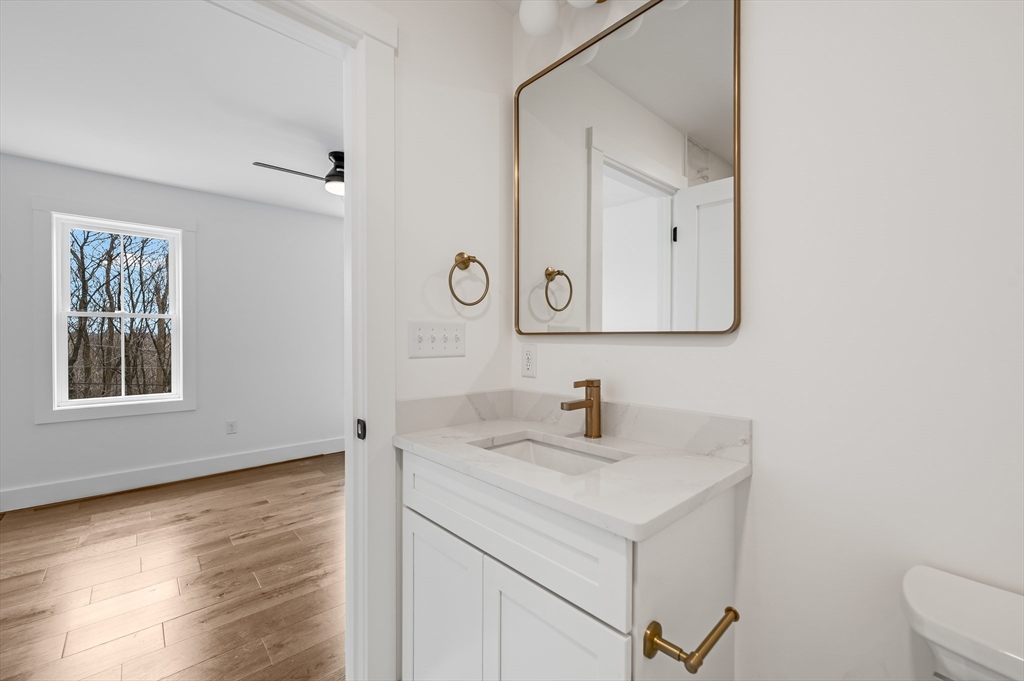 36 Belvidere Road Haverhill, MA 01830 - Photo 15 of 18 a bathroom with a sink and a mirror