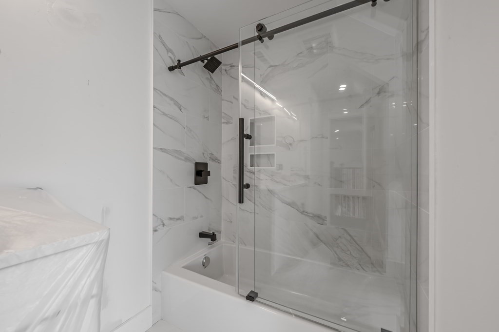 36 Belvidere Road Haverhill, MA 01830 - Photo 16 of 18 a bathroom with a shower and a bathtub