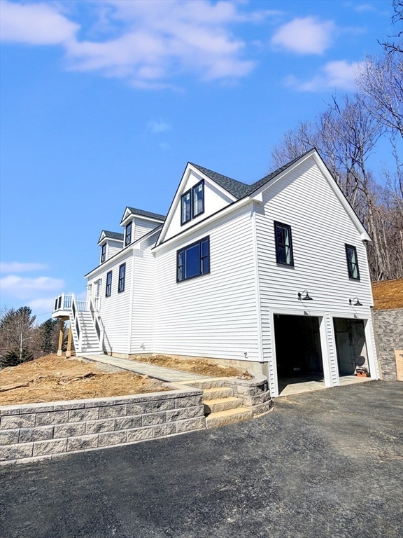 36 Belvidere Road Haverhill, MA 01830 - Photo 2 of 18 a view of a house with a yard