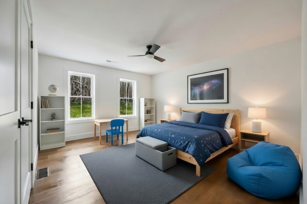 36 Belvidere Road Haverhill, MA 01830 - Photo 8 of 18 a spacious bedroom with a bed and glass window