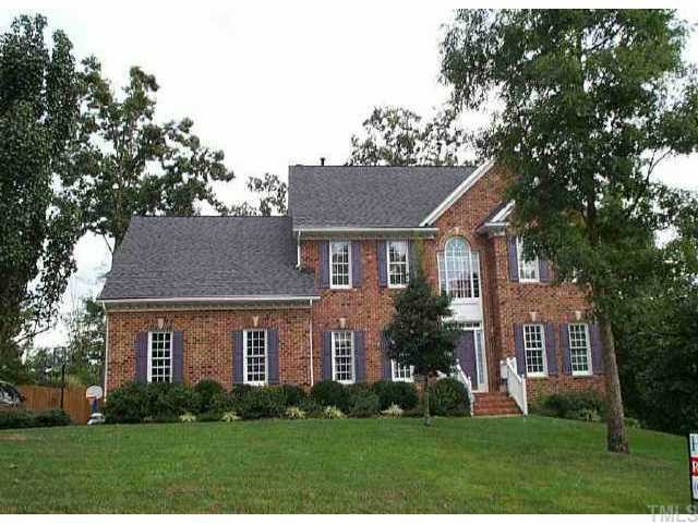 1516 October Road Raleigh, NC 27614 - Photo 1 of 1 a front view of a house with garden and trees