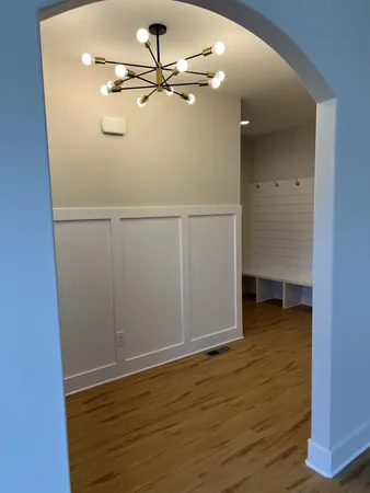 a view of a livingroom with wooden floor
