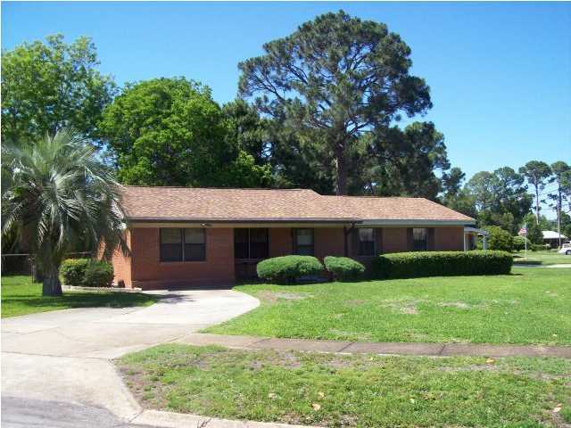 235 Deluna Road Southwest Fort Walton Beach, FL 32548 - Photo 1 of 24 a front view of house with yard and green space