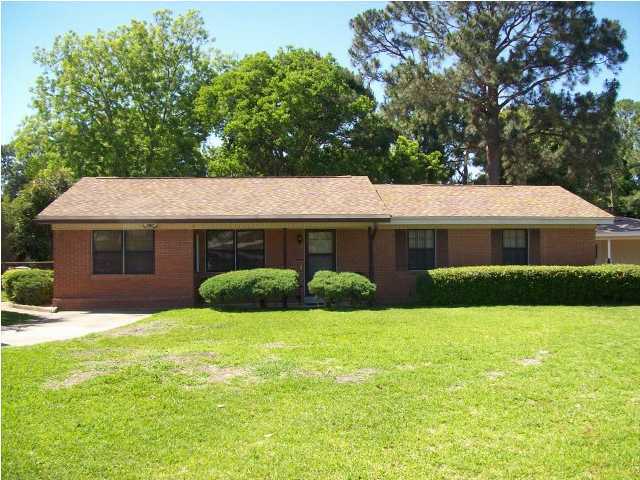 235 Deluna Road Southwest Fort Walton Beach, FL 32548 - Photo 24 of 24 a front view of a house with yard and garage