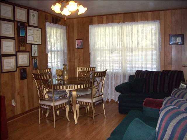 235 Deluna Road Southwest Fort Walton Beach, FL 32548 - Photo 8 of 24 a view of a livingroom with furniture and window