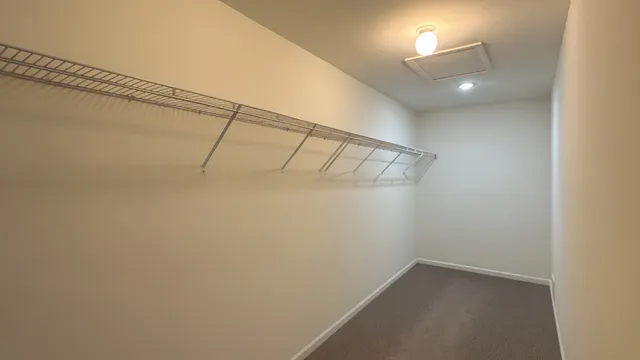 a view of a room with racks on the wall