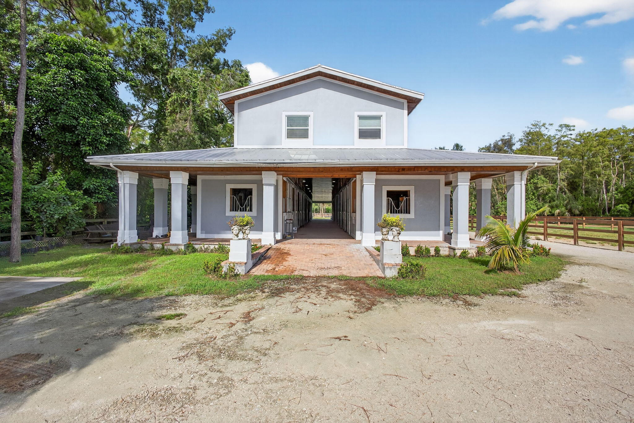 1032 Hyde Park Road Loxahatchee Groves, FL 33470 - Photo 17 of 30 front view of a house with a yard