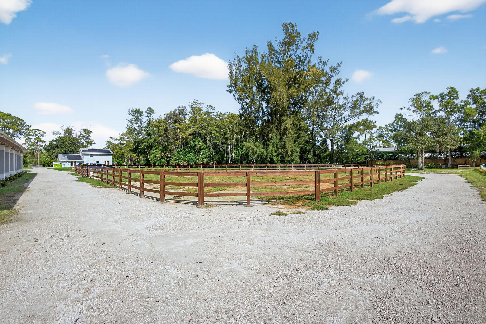 1032 Hyde Park Road Loxahatchee Groves, FL 33470 - Photo 21 of 30 a view of a backyard