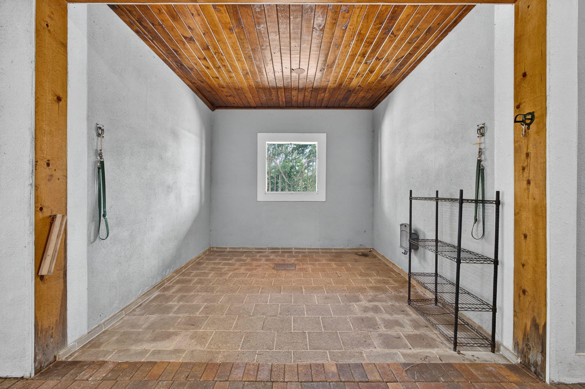 1032 Hyde Park Road Loxahatchee Groves, FL 33470 - Photo 6 of 30 a view of an empty room with a window