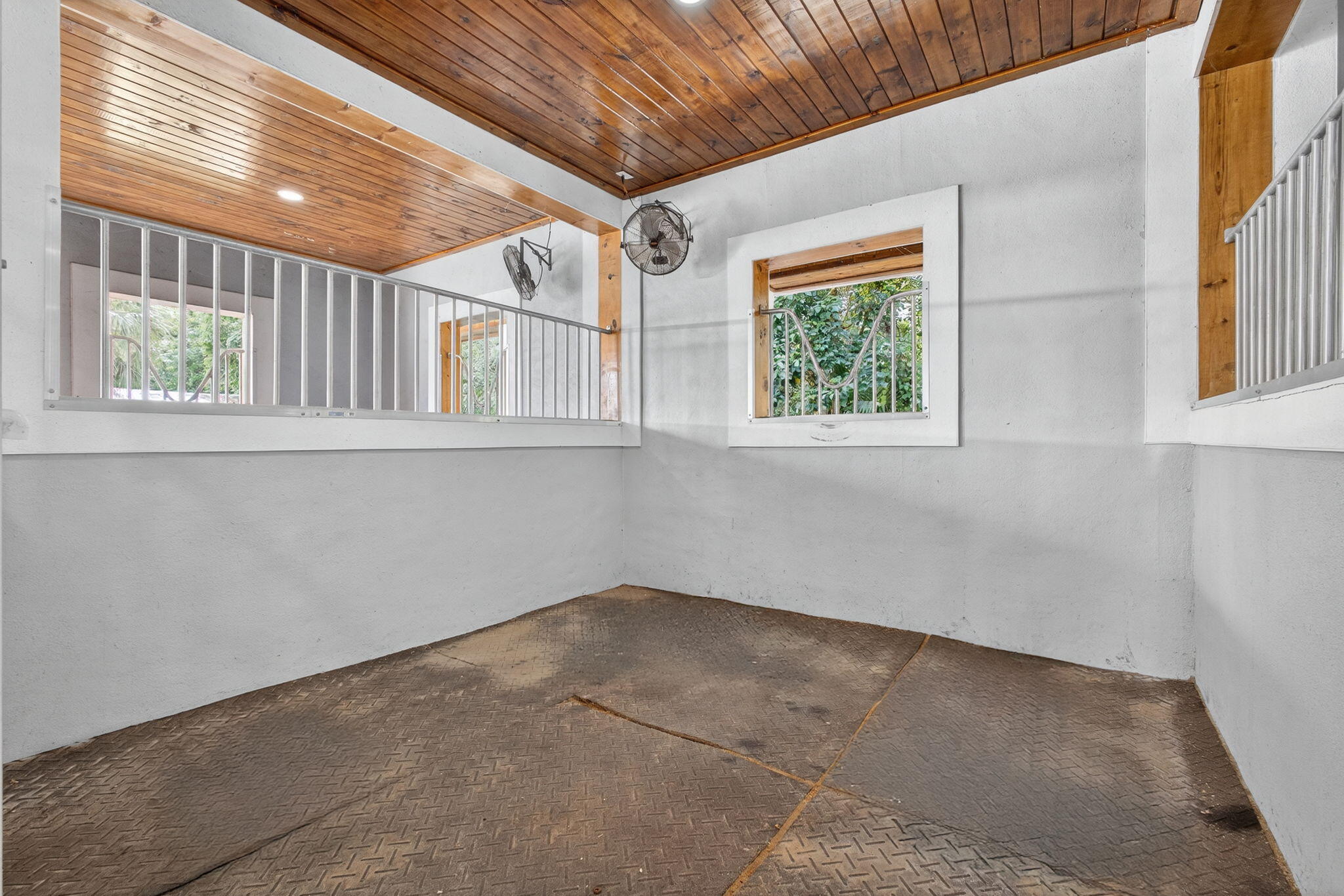 1032 Hyde Park Road Loxahatchee Groves, FL 33470 - Photo 7 of 30 a view of an empty room with a window