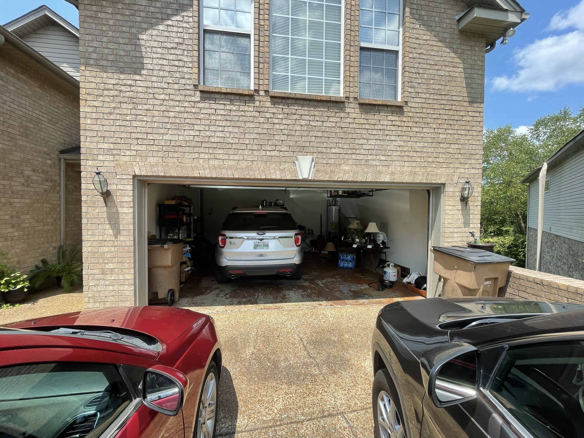 721 Canoe Ridge Point Antioch, TN 37013 - Photo 2 of 50 a view of a patio with two chairs and a barbeque