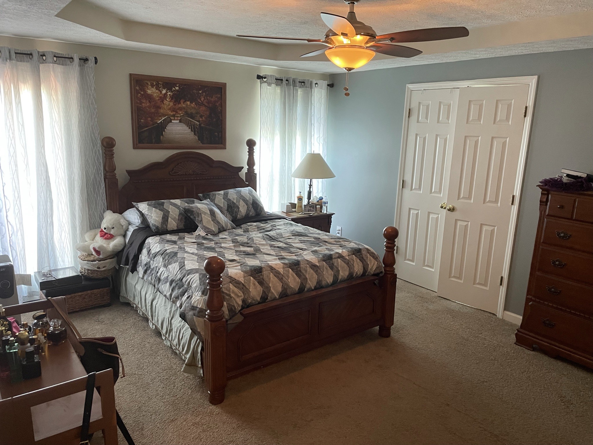 721 Canoe Ridge Point Antioch, TN 37013 - Photo 16 of 50 a bedroom with a bed and a chandelier
