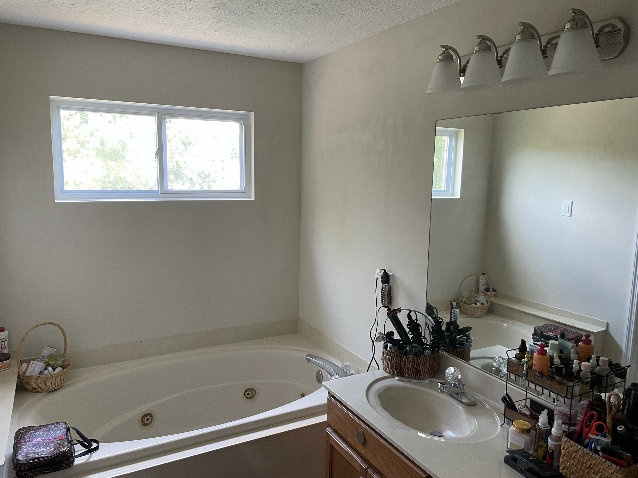 721 Canoe Ridge Point Antioch, TN 37013 - Photo 19 of 50 a bathroom with a sink and a bathtub