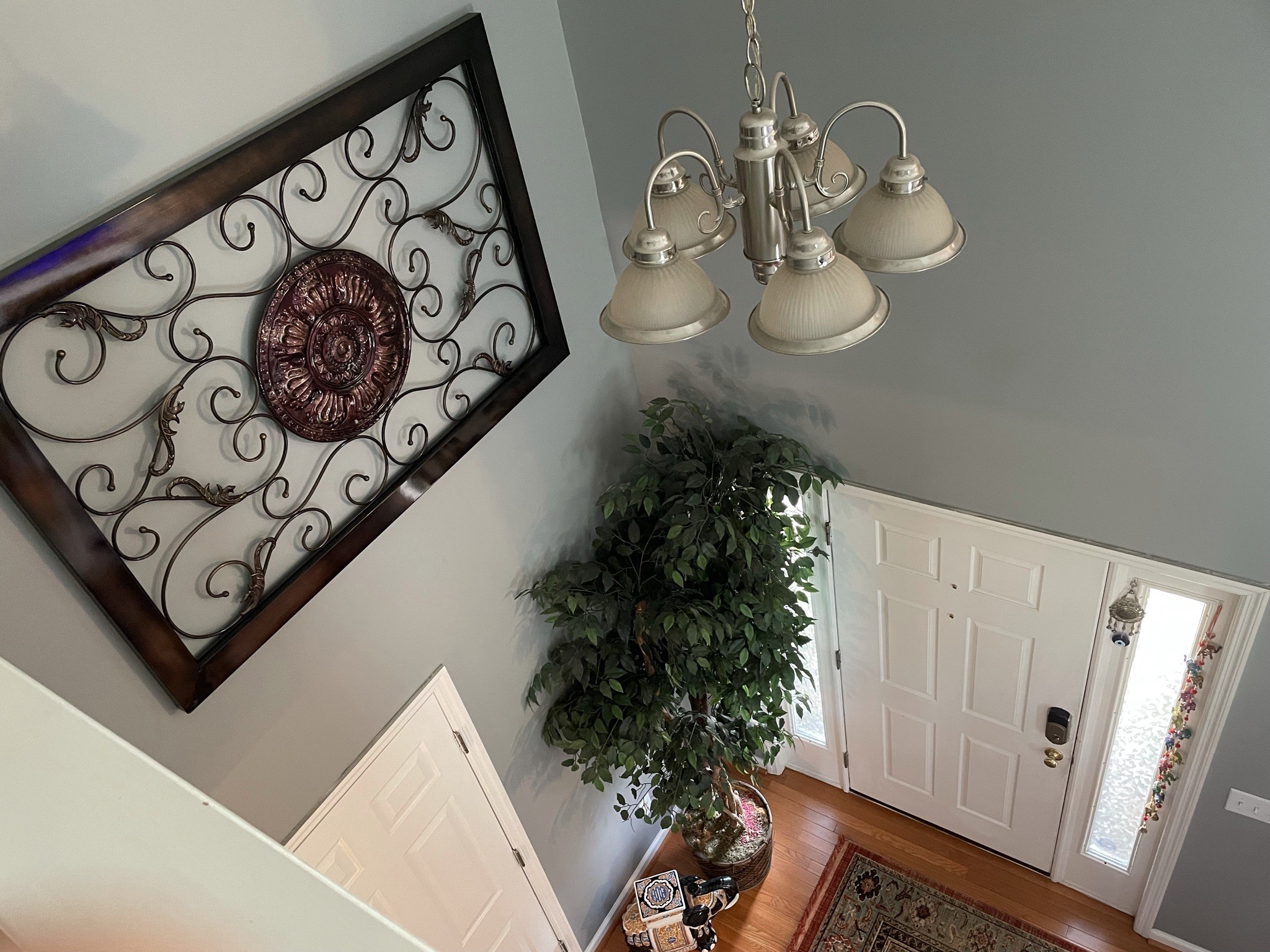 721 Canoe Ridge Point Antioch, TN 37013 - Photo 24 of 50 a view of a hallway with paintings on the wall
