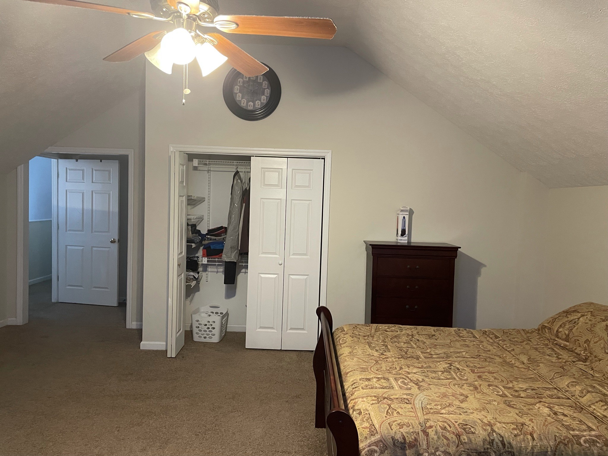 721 Canoe Ridge Point Antioch, TN 37013 - Photo 27 of 50 a bedroom with a bed and a chandelier