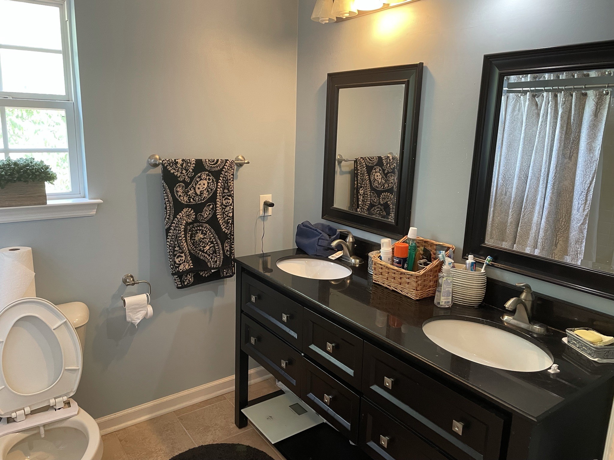 721 Canoe Ridge Point Antioch, TN 37013 - Photo 37 of 50 a bathroom with a double vanity sink and a mirror