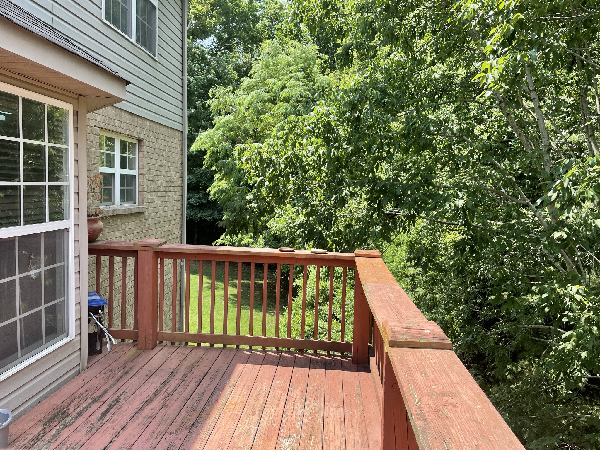 721 Canoe Ridge Point Antioch, TN 37013 - Photo 40 of 50 a view of balcony with wooden floor and fence