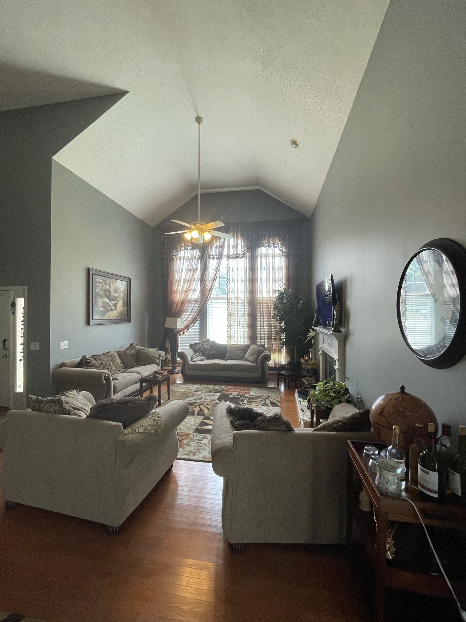 721 Canoe Ridge Point Antioch, TN 37013 - Photo 6 of 50 a living room with furniture kitchen view and a large window
