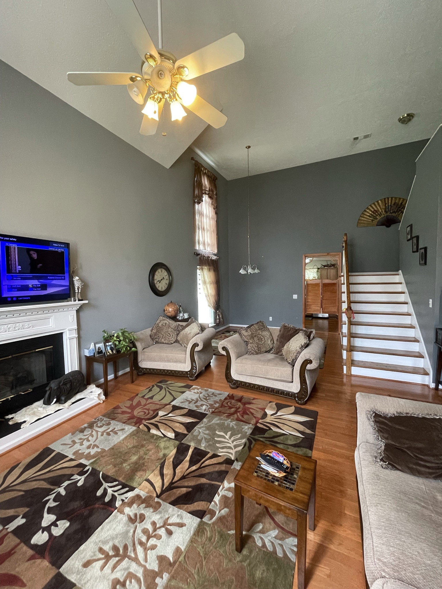 721 Canoe Ridge Point Antioch, TN 37013 - Photo 7 of 50 a bedroom with a bed and a fireplace
