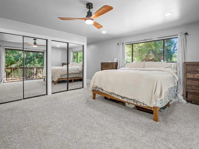 a bathroom with a shower and a sink