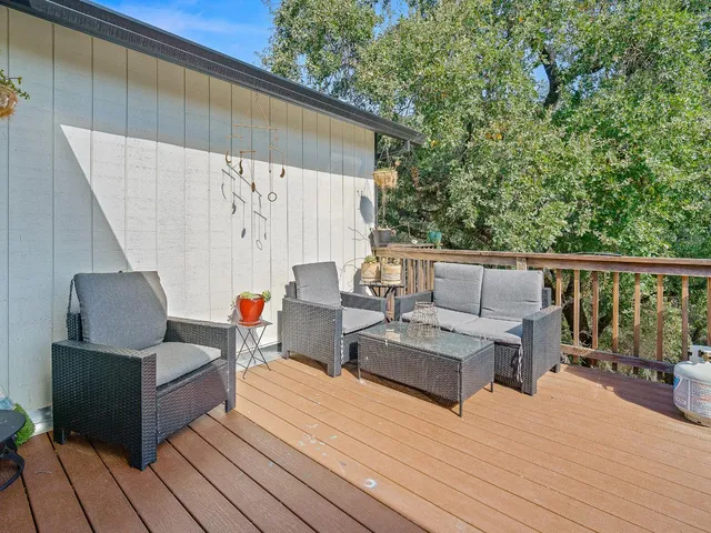 a view of a terrace with chairs