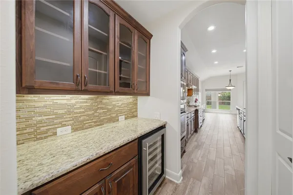a view of a kitchen cabinets and a counter place