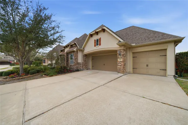 front view of a house with a garage