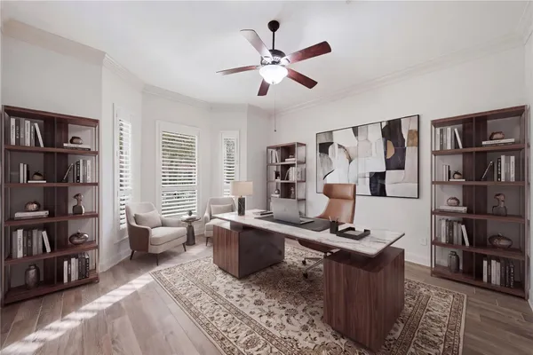 a work room with furniture and book shelf