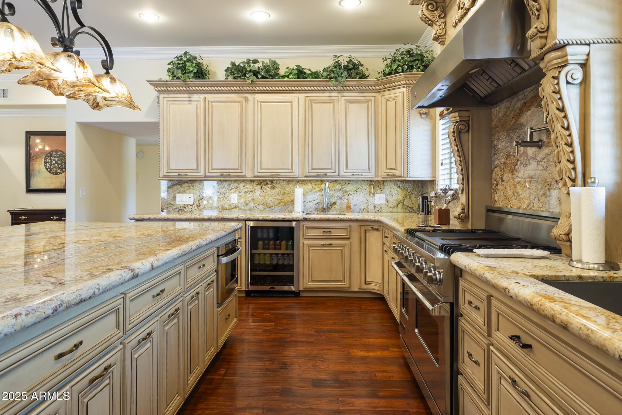 229 West Vista Avenue Phoenix, AZ 85021 - Photo 23 of 113 a kitchen with stainless steel appliances granite countertop a stove a sink dishwasher and a refrigerator