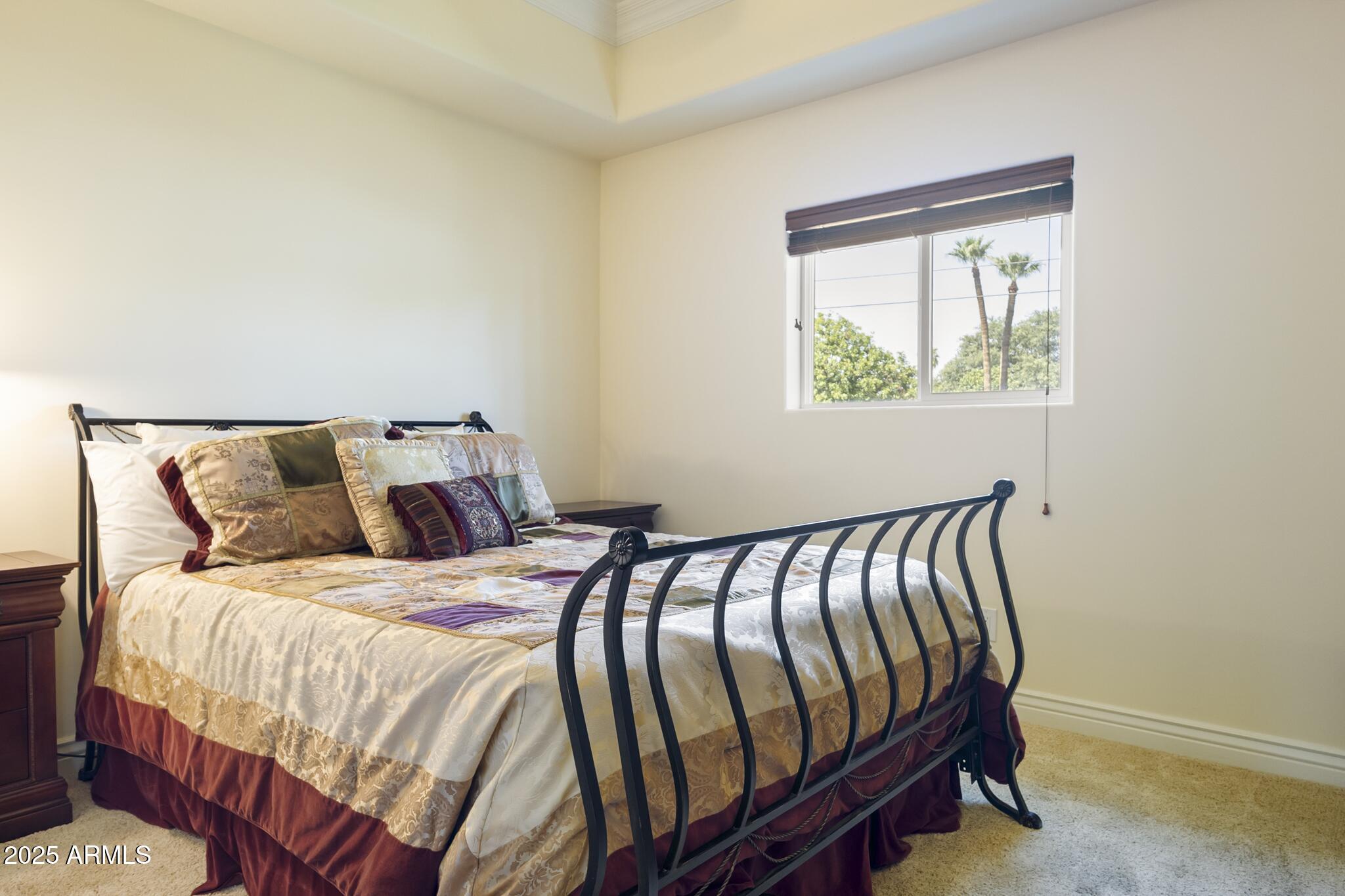 229 West Vista Avenue Phoenix, AZ 85021 - Photo 37 of 113 a bed sitting in a bedroom next to a window