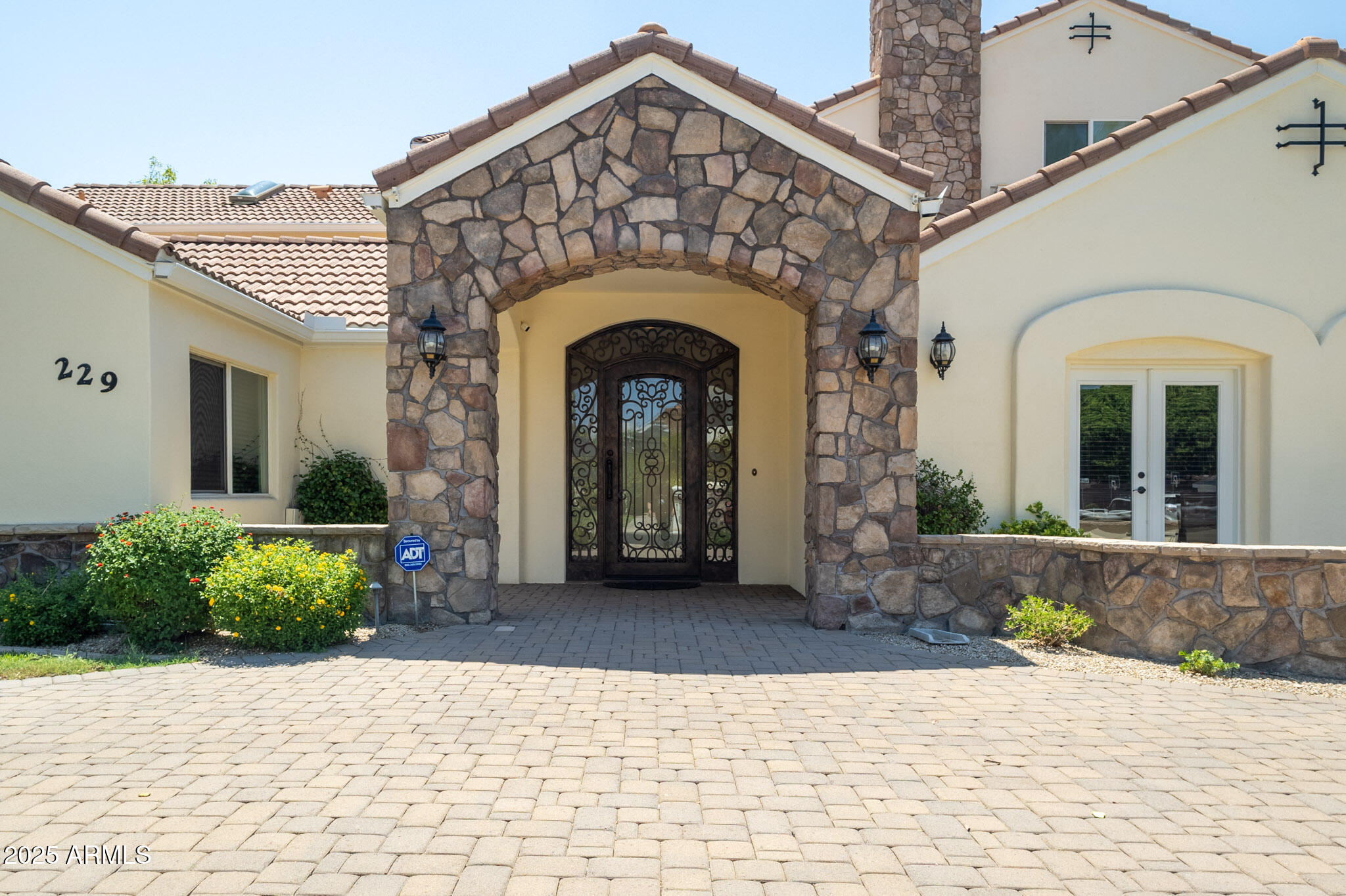 229 West Vista Avenue Phoenix, AZ 85021 - Photo 5 of 113 a front view of a house with potted plants